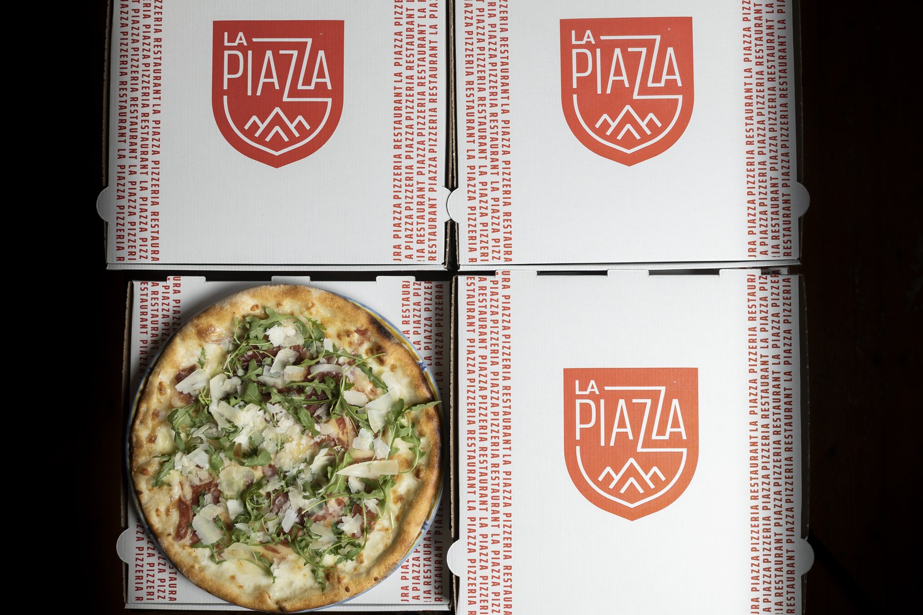 Pizza de La Piazza lista para llevar a domicilio